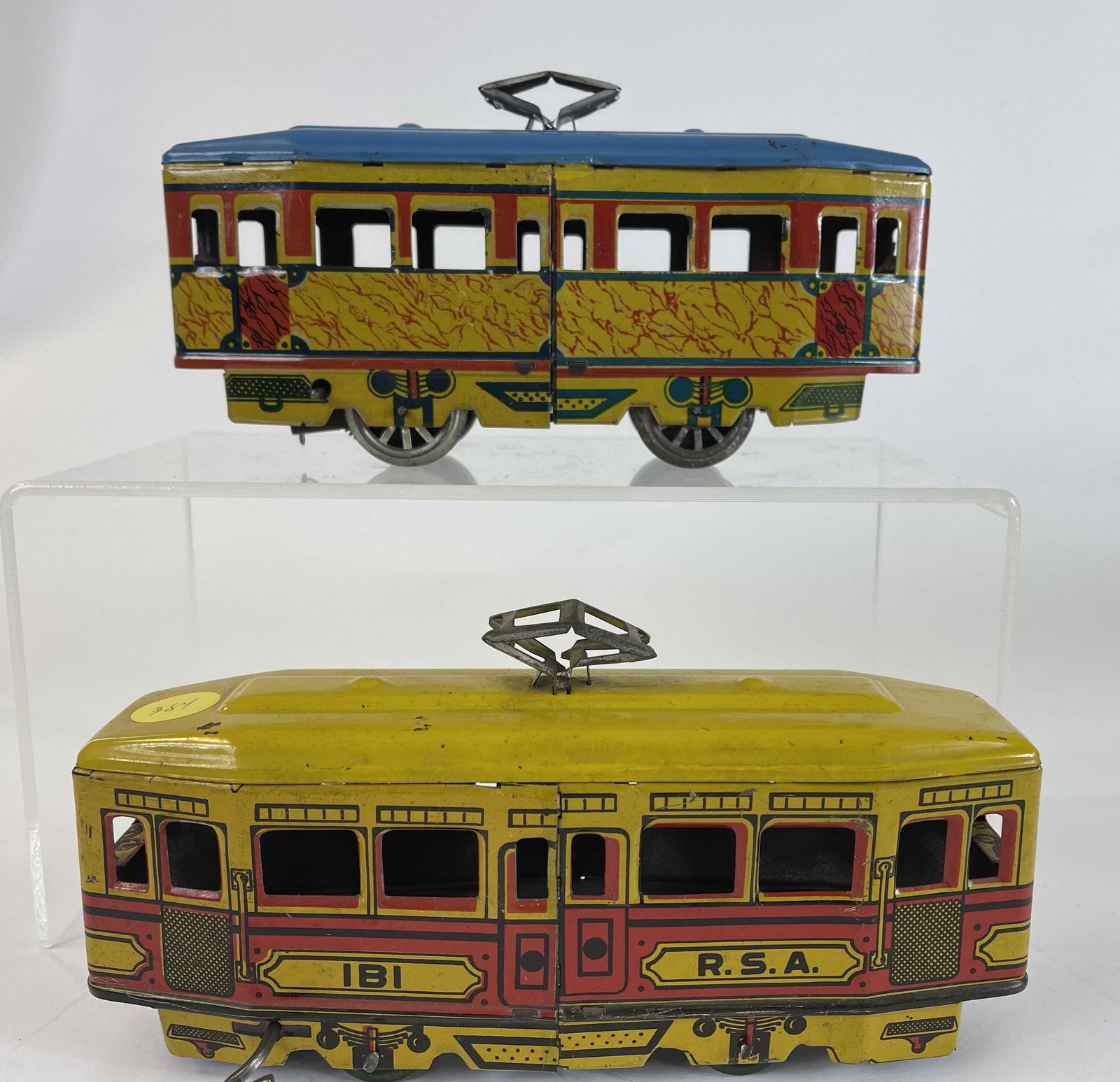 Two Tin Trolley Toys (1 of 3)