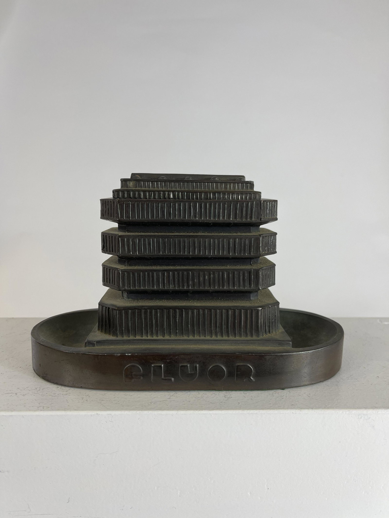 Fluor Building Match Holder: and Ashtray. American - 1950's - 4 5/8" Tall. Excellent Condition. Fluor is an American Corporation headquartered in California that began operations about 1915.