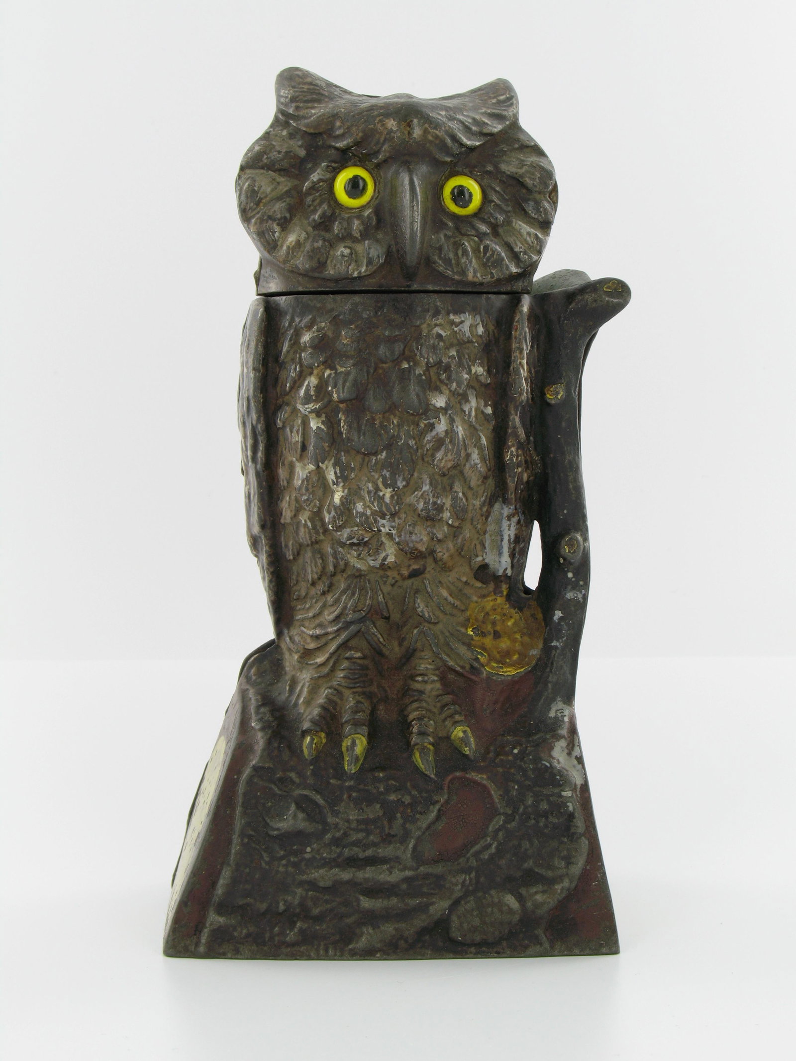 Owl Turns Head Mechanical Bank: Made by J. & E. Stevens. Cromwell, Connecticut. Circa 1880. Cast Iron. Olive with coin trap. Excellent Condition.