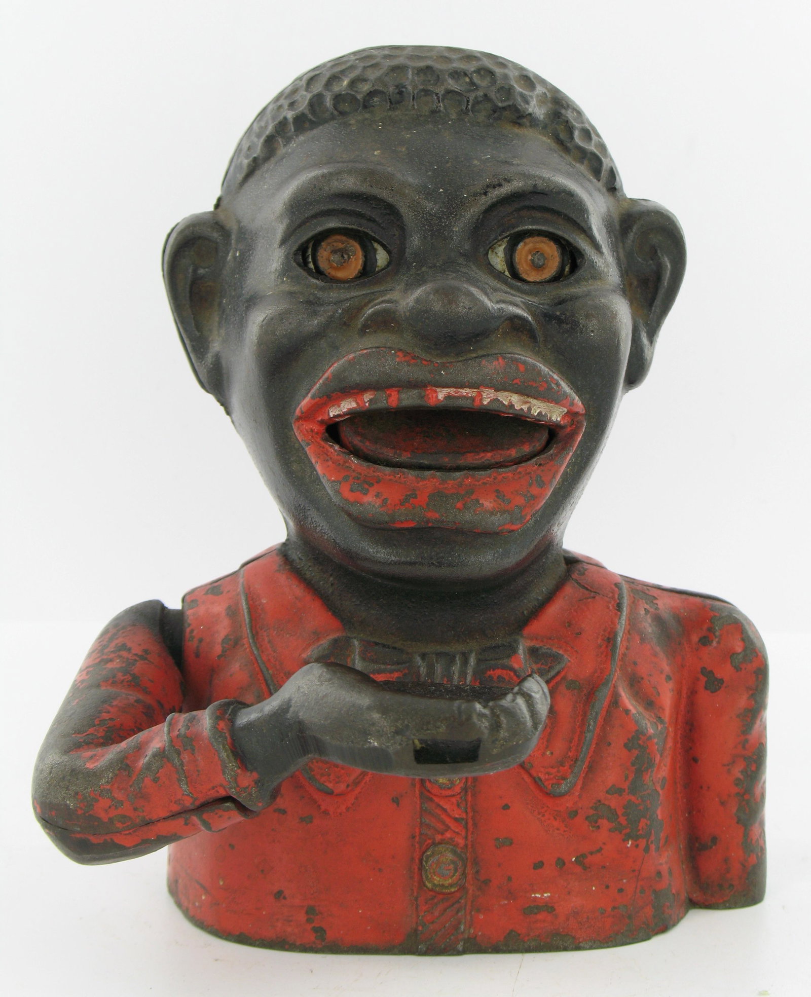 Jolly Man Harper Butterfly Tie Bank: Made by John Harper. England. Circa 1905. Cast Iron. With red tie and two part cast arm. Holed base. Has internal repair as well as repaired base. One ear screw is not original. Excellent Condition.
