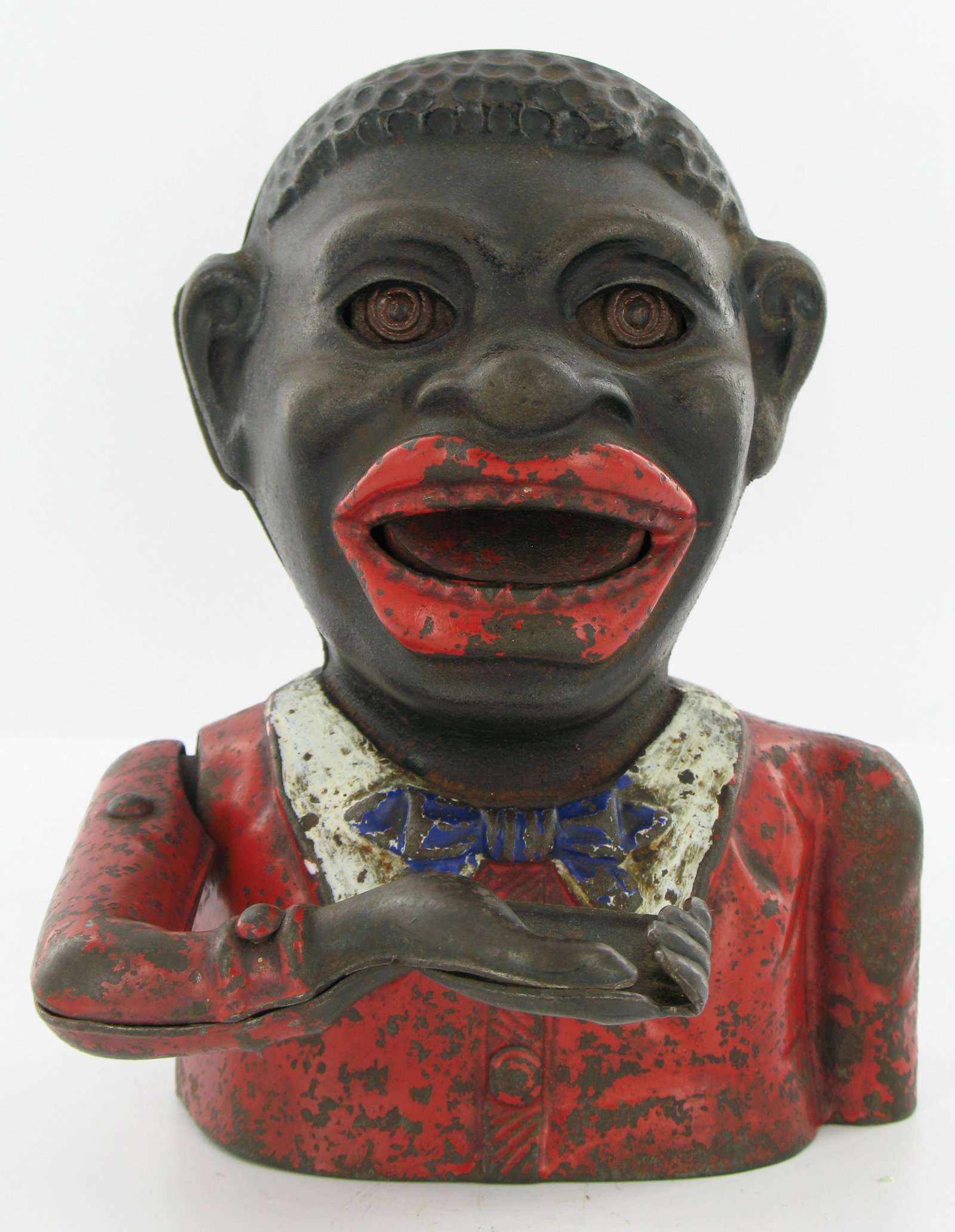 Jolly Man Harper Butterfly Type 2 Bank: Made by John Harper. England. Circa 1920. Cast Iron. With white collar, blue tie and two piece steel plate arm riveted together. Square plate steel base with key lock and original key. Very Good Condi