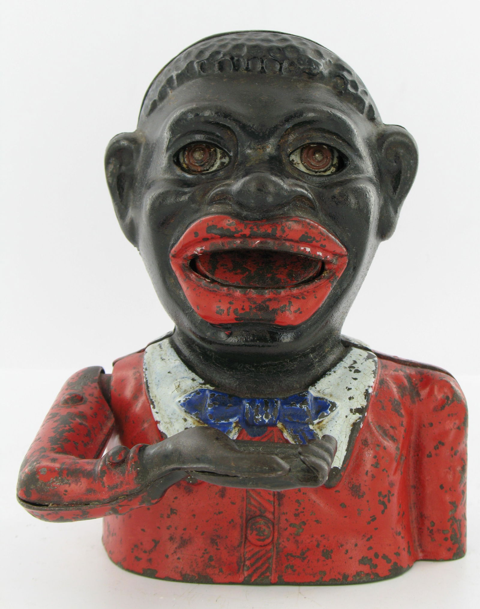 Jolly Man Harper Butterfly Type 2 Bank: Made by John Harper. England. Circa 1920. Cast Iron. With white collar, blue tie and two piece steel plate arm riveted together. Plate base. Very Good Condition.