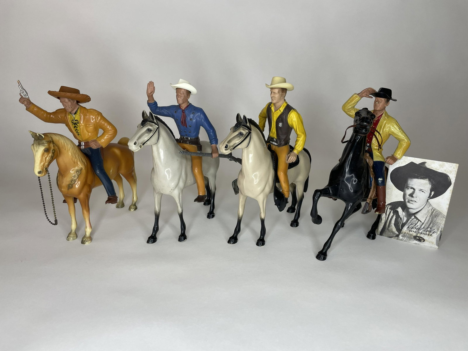 Lot of 4 Hartland Cowboys on Horses: Including Cheyenne, Tom Jeffords from the show Broken Arrow, Hoby Gillman from the TV show Trackdown and Matt Dillon from the TV show Gun Smoke. 9 1/4 inches high. 4 Pieces. Good Condition; Missing a 