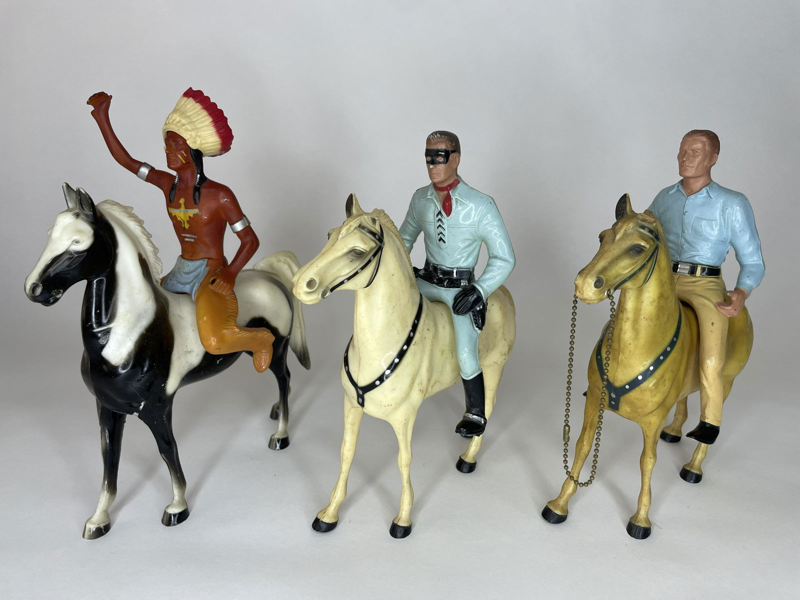 Lot of 3 Hartland Cowboys and Indians: Including Dale Evans, The Lone Ranger and Tonto. 9 1/4 inches high. 3 Pieces. Good Condition; Missing a variety of accesories.