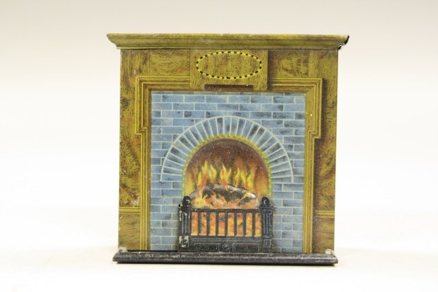 Fireplace Bank: Fireplace Bank, England, circa 1930's. The bank is 4.5" tall and made of tin. The bank is in very fine condition.