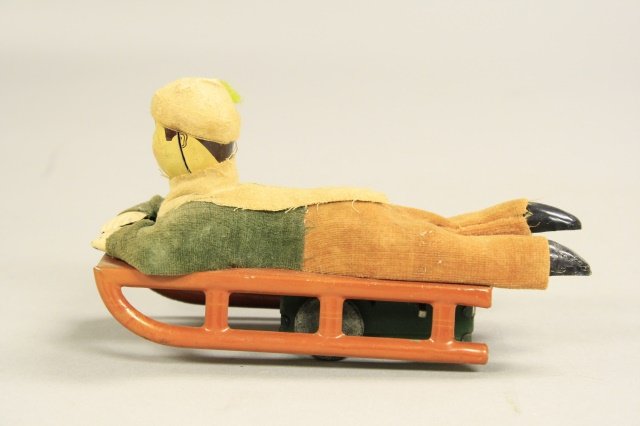 Boy Riding a Sled (1 of 2)