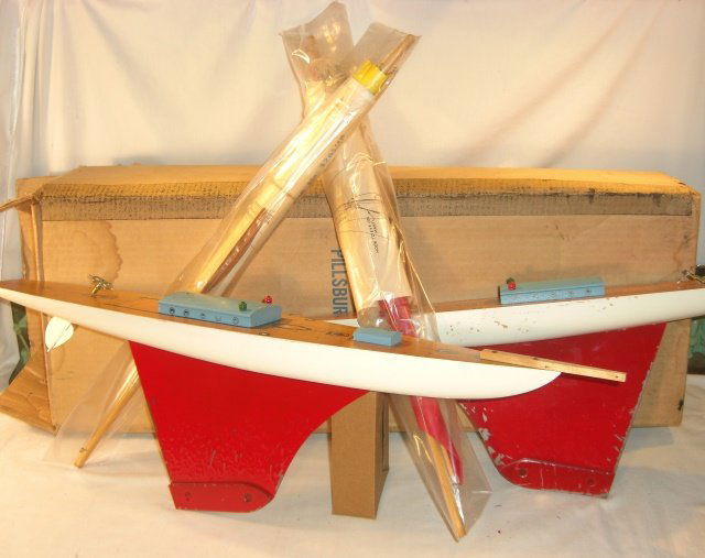 2 KEYSTONE SAILBOATS "PILLSBURY" IN BOX: Each 24" long, 9 1/2" high w/o sails; sails with rigging instructions, about 24" high each. 1 red and 1 yellow sail; condition very good