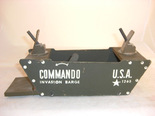 COMMANDO TOYS "COMMANDO INVASION BARGE": Wood; copyright 1943; "U.S.A. 1265"; 11" long; moves on wooden rollers; gun turrets turns; from "Wood Commodities Corp"; condition very good