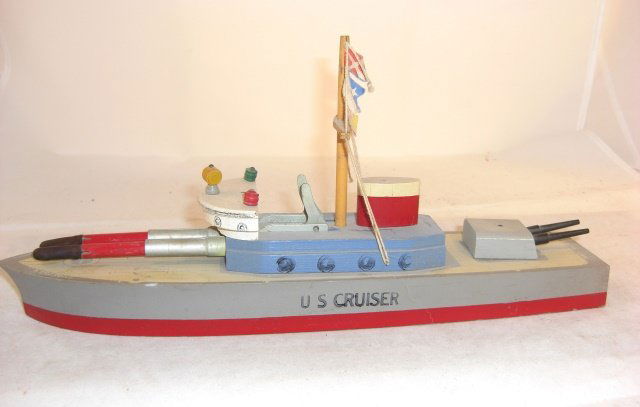 KEYSTONE "U.S. CRUISER": Wood; 14" long; 2 rockets; spring firing mechanism, spring trigger not catching; condition very good