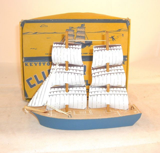 KEYSTONE CLIPPER SHIP IN ORIGINAL BOX: Wood w/ wood masts & plastic sails; 8" long, 6 1/2" high; box 7" x 9 1/2"; ship condition excellent, box very good