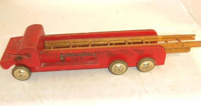 WOOD HOOK & LADDER TRUCK: 15" long with 14 1/2" ladders; one ladder has rungs detached from side rail; condition good
