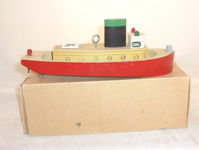 KEYSTONE #787 SPRING MOTOR-DRIVEN TUG: Wood; 10" long; with box; winds up, works; condition excellent with fair box