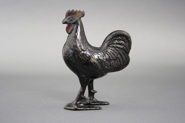 Rooster Bank: Rooster Bank (4 5/8" H). Made of cast iron and in excellent condition. Made by Arcade of the United States circa 1915.