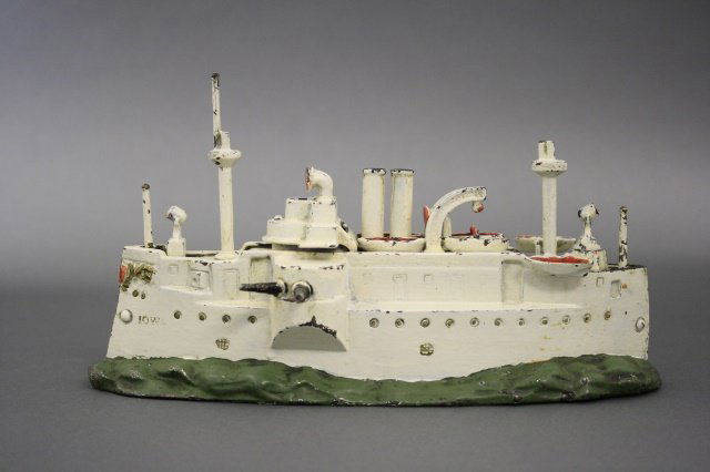 Battleship Iowa Bank: Battleship Iowa (10" L). Made of cast iron and in excellent condition (one mast broken in half, half missing). Made by J. & E. Stevens circa 1900.