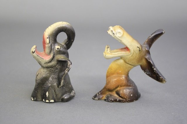 Donkey and Elephant Bottle Openers: Wilton Mfg of America circa 1930. They are 3 - 3 1/2" H. Made of Cast Iron. They are in Excellent and Bright Condition.