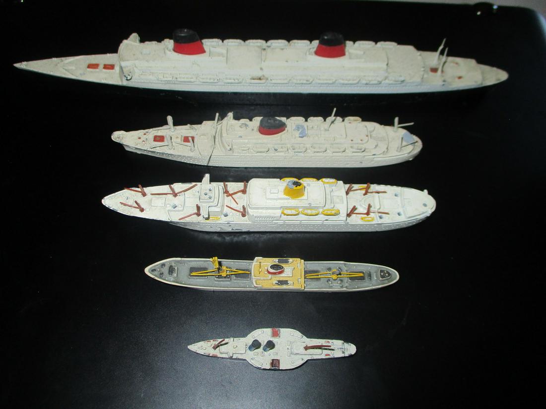 Lot of 5 Diecast Model Ships: Lot of 5 Diecast Model Ships 1. S. S. France2. R.M.S. Arlanza3. Antilles4. Bremerhaven5. P. S. Cardiff Queen Dimensions: Length - Smallest 2 1/4" - Largest 10 1/2"