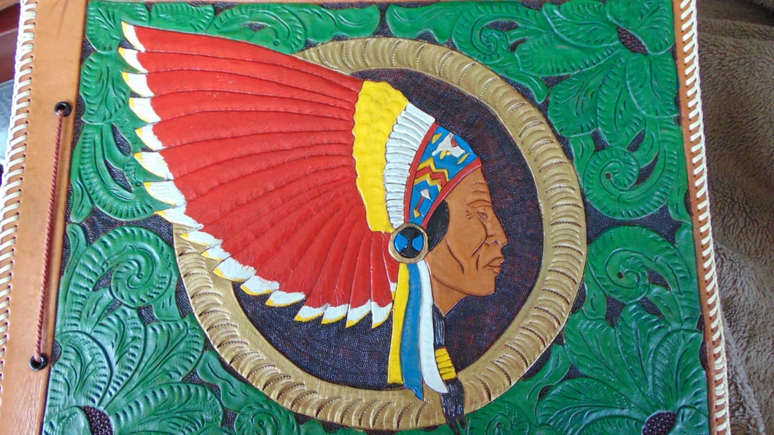 Navajo Chief Tooled Hand Colored Leather Scrapbook: Navajo Chief Tooled Hand Colored Leather Scrapbook A magnificent tooled and hand colored in bright green and red. The Indian Chief presented in a impressed gold circle. The reverse is equally amazing 