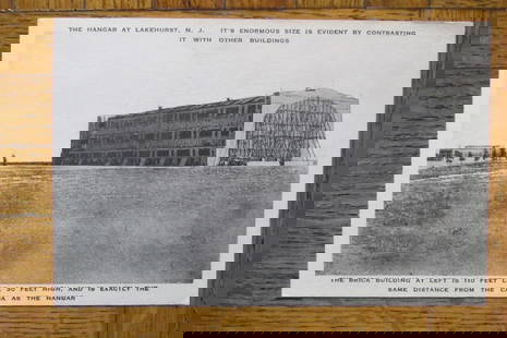 The Hanger At Naval Air Station Lakehurst NJ: >The Hanger At Lakehurst, NJ It's Enormous Size is Evident by Contrasting It With Other Buildings. The Brick Building at Left is 110 Feet Long, 30 Feet High and is Exactly the Sae Distance from the
