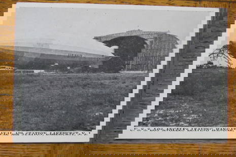 USS Los Angeles Naval Air Station Lakehurst NJ: U.S.S. Los Angeles Leaving Hangar Naval Air Station, Lakehurst, N.J. Published by the Happy Landings Cafe, Lakehurst, NJ. Rare. Dated: Circa 1930's Type/Theme: Military Size: Standard Publisher: