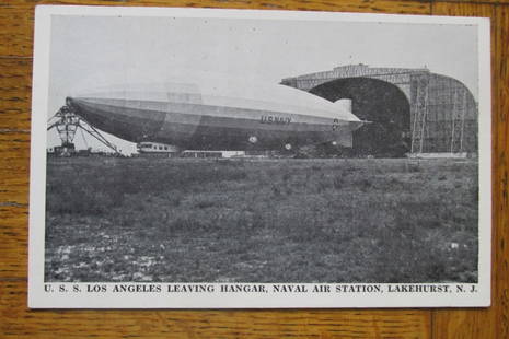 USS Los Angeles Naval Air Station Lakehurst NJ: U.S.S. Los Angeles Leaving Hangar Naval Air Station, Lakehurst, N.J. Published by the Happy Landings Cafe, Lakehurst, NJ. Rare. Dated: Circa 1930's Type/Theme: Military Size