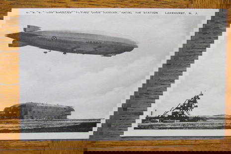 USS Los Angeles Naval Air Station Lakehurst NJ: U.S.S. Los Angeles flying over Hanger Naval Air Station, Lakehurst, N.J. Published by the Airship Photo Service, Lakehurst, NJ. Rare. Dated: Circa 1930's Type/Theme: Military Airships Size: