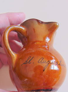 St. Augustine Florida Pitcher: St, Augustine Florida Brown Glazed Pitcher Scarce Origin: American Date/Period: Circa 1910/1930 Dimensions: H 3" x W 3" x B 2" Condition Report No defects noted.