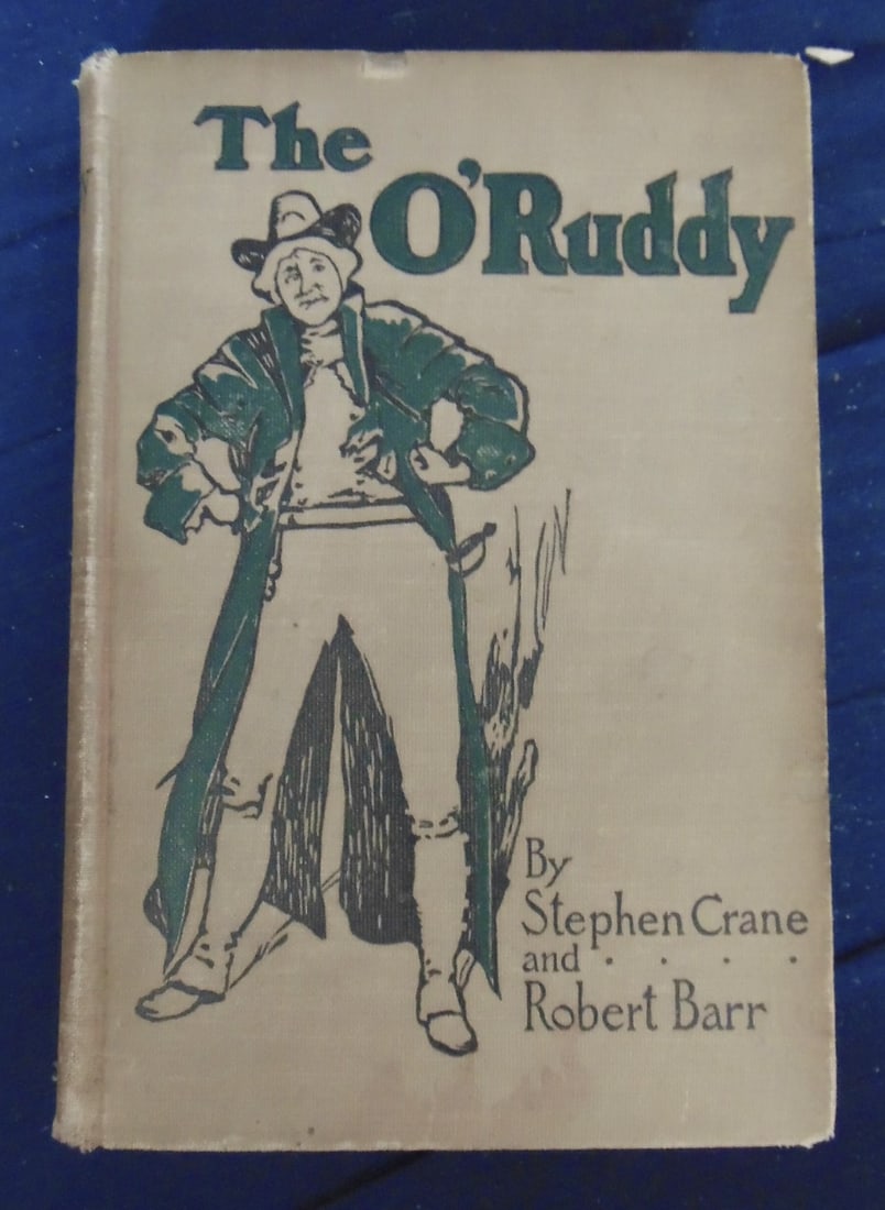 The O'Ruddy 1st Edition of Last Stephen Crane book: The O'Ruddy Original tan cloth with stamped black and green illustration. Color frontispiece by C.D. Williams. The O'Ruddy was the last book Stephen Crane wrote before his untimely death in 1908. The 