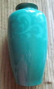 Beautiful Japanese Enamel Vase: Fine Japanese Enamel Vase Tapering classical form, decorated with floral design to the shoulders in light green color on darker green ground, with silver top rim. Copper rimme
