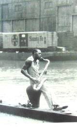 Saxophone Player on a Hudson River Pier