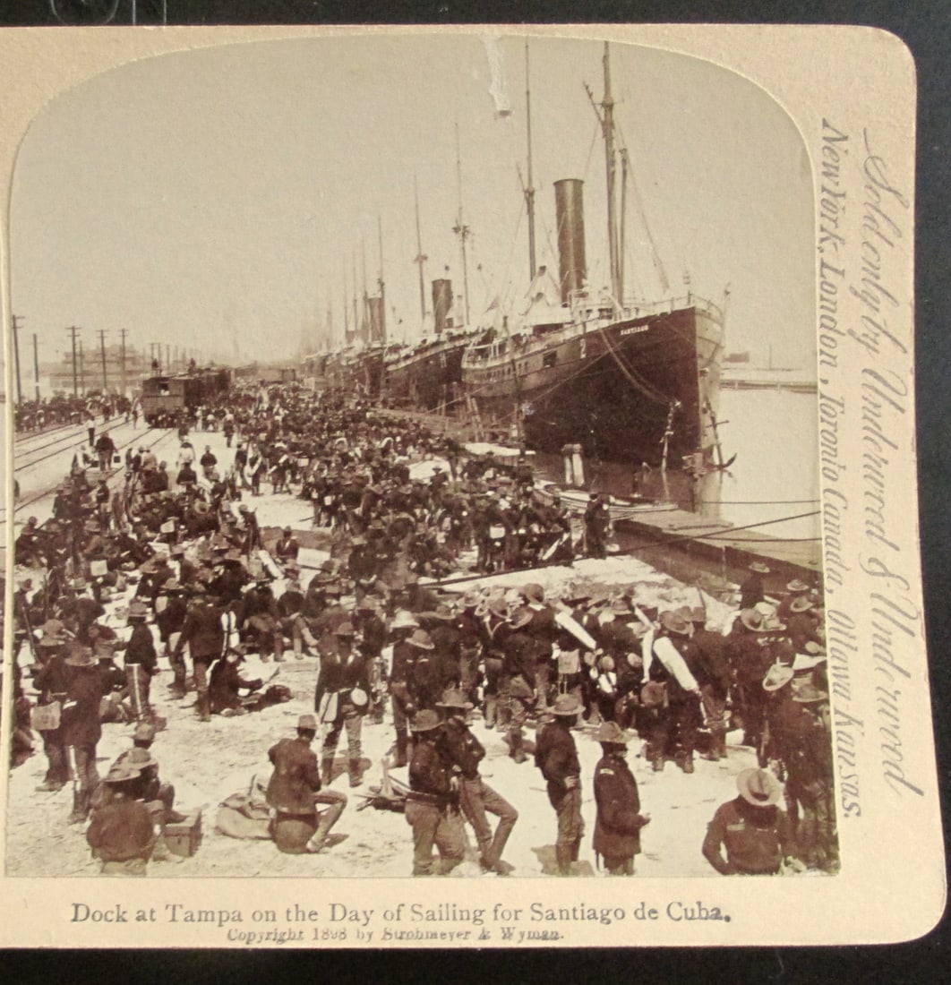 Dock at Tampa on Sailing Day for Santiago de Cuba: Dock at Tampa on Sailing Day for Santiago de Cuba A rare view. Spanish American War In usually Fine Condition Dated: 1898 Subject: Spanish American War<