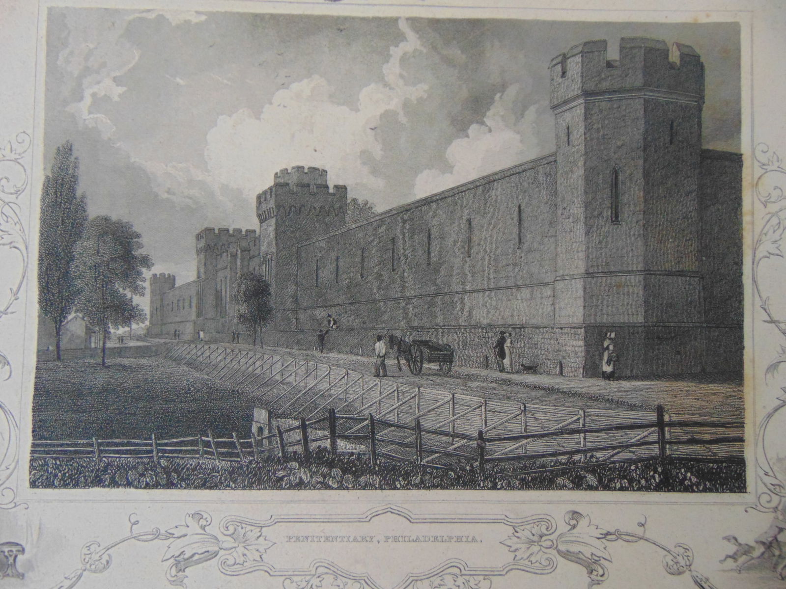 Penitentiary Philadelphia Pennsylvania: Penitentiary Philadelphia Pennsylvania With Vignettes. Print is neatly tipped in with toned mat. Print Type: Engraving Date: c1839 Dimensions: 12.5 x 10.5" Provenance: Hill House Print Collection
