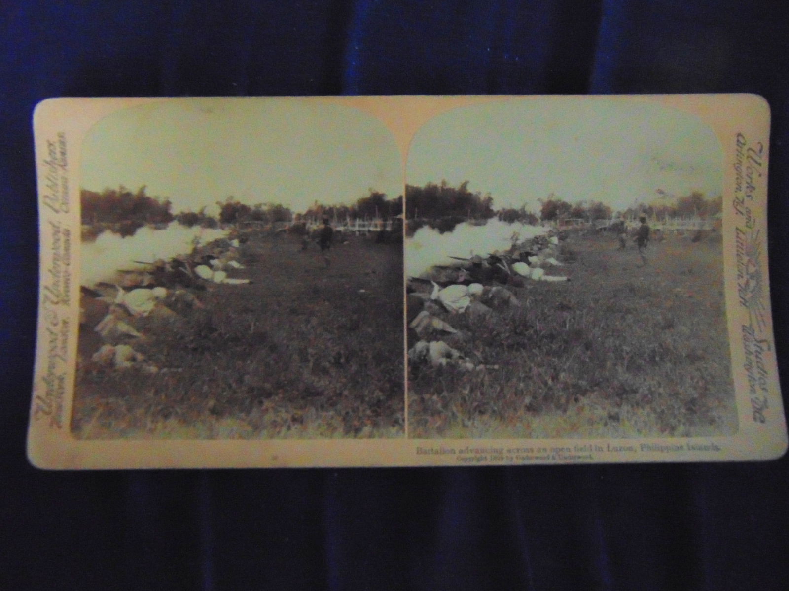 Battalion Advancing Philippine Islands: Battalion Advancing Across An Open Field in Philippine Islands From the period of the Philippine-American War, a conflict that followed the Spanish-American War and involved U.S. efforts to control