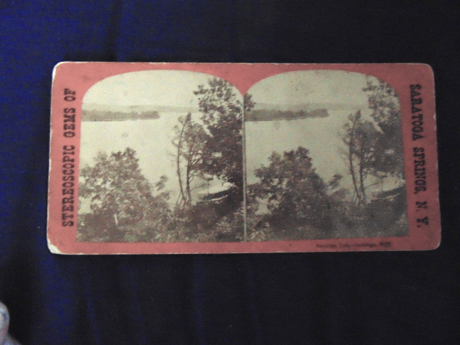 Saratoga Lake - Saratoga New York: Saratoga Lake - Saratoga New York Stereoscopic Gems of Saratoga Springs NY Dated: 1899 Medium: Stereoview Provenance: Hill House Photograpy Collection Condition Report Pencil marks on verso. Good