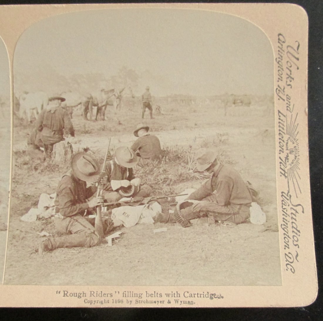 Rough Riders - Filling Belts with Cartridges: Rough Riders - Filling Belts with Cartridges A rare view. Spanish American War In usually Fine Condition Dated: 1898 Subject: Spanish American War Med