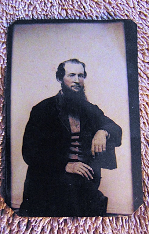 A Portrait of a Gentleman - Newburgh NY: A Portrait of a Gentleman A excellent and striking bearded gentleman. From a Newburgh NY estate. Possibly a Sea Captain. Photographer: Annon. Dated: Late 1850's Medium: Tintype Dimensions: 3.5 x