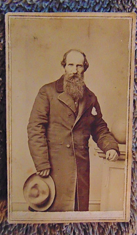 A Portrait of a Gentleman -Mrs. Moore - Rare: A Portrait of a Gentleman Standing by Pedestal with Ball Matilda Moore was a remarkable fixture of the New York photographic scene, and her studio at 421 Canal Street represents a rare instance of a