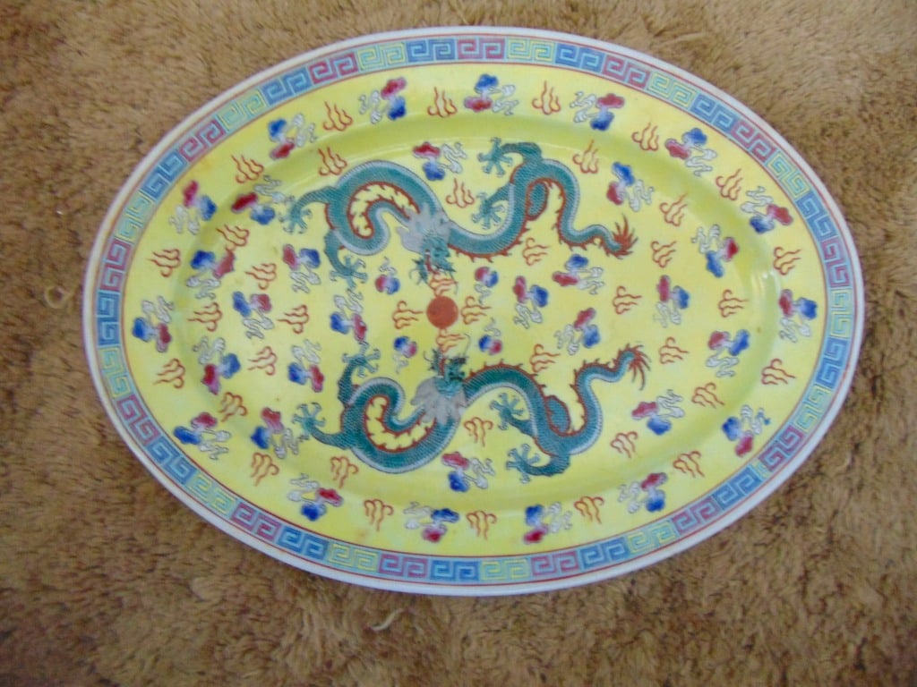 Chinese Famille Jaune Dragon Platter: Chinese Famille Jaune Dragon Platter Large Serving Platter. Matching Green scaled 5 clawed Dragon Chasing A Red Ball in Center. Dimensions: L 14 H 10 D 1" Condition Report No defects noted<