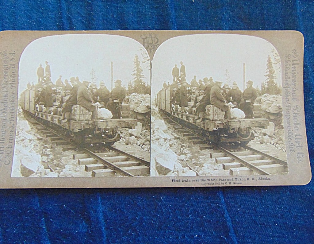 First Train over the White Pass & Yukon Alaska: First Train over the White Pass & Yukon Railroad - Alaska This Art Nouveau Series stereoview, published by C.H. Graves in 1902, captures a rare and chaotic scene: the end of a