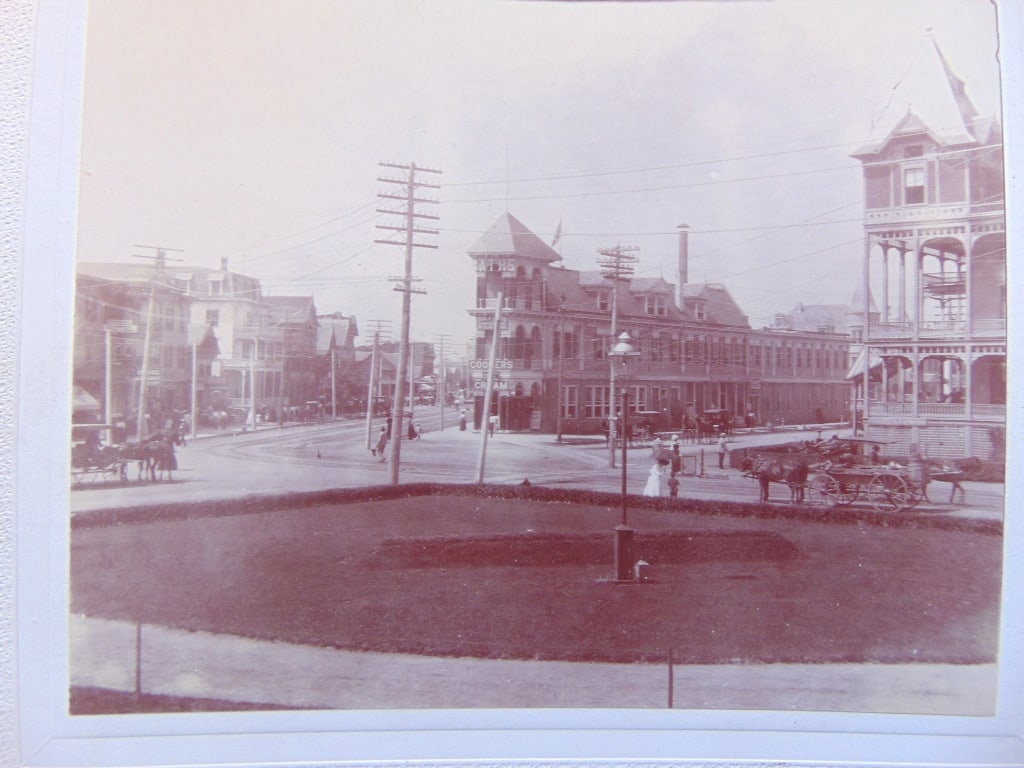 Down Town at Asbury Park New Jersey 1910: Down Town at Asbury Park New Jersey - Mounted Photograph of Asbury Park New Jersey Rare Photographer: Unknown Dated: Circa 1910 Medium: Silver Gelatin Dimensions: 5 1/4
