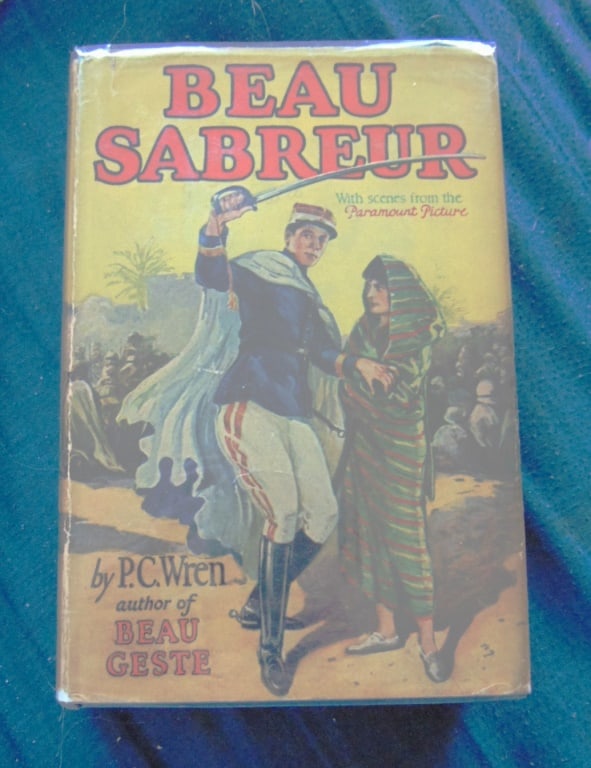 Beau Sabreur - P. C. Wren - Photo Play w/ DJ: Beau Sabreur - Photo Play w/ DJ All Photos Present. Dust wrapper is in clear archival cover. With scenes frtom the Paramount Picture. Author: P. C. Wren Illustrations: Photos Date