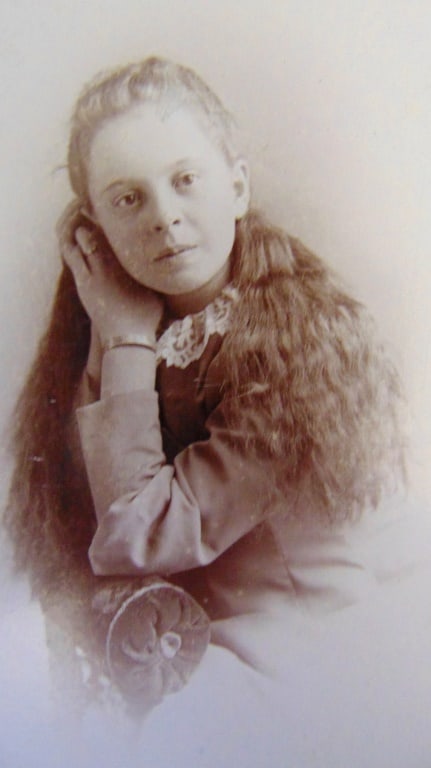Young Girl with Long Flowing Hair by Bracy: Young Girl with Long Flowing Hair Photographer: Charles F Bracy Dated: 1890's Subject: Portraits - Women Medium: Cabinet Card - Black Provenance: Hill House Photography Portraiture Country/Origin: