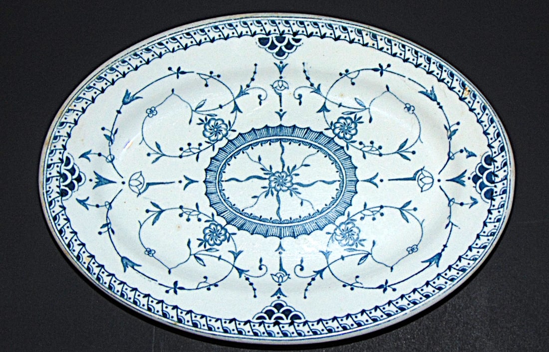 Blue & White L Straus & Sons Oval Plate: Blue & White L Straus & Sons Oval Plate L. Straus & Sons was a prominent 19th-century American importing firm founded by Lazarus Straus in 1866, specializing in high-end china, porcelain, and