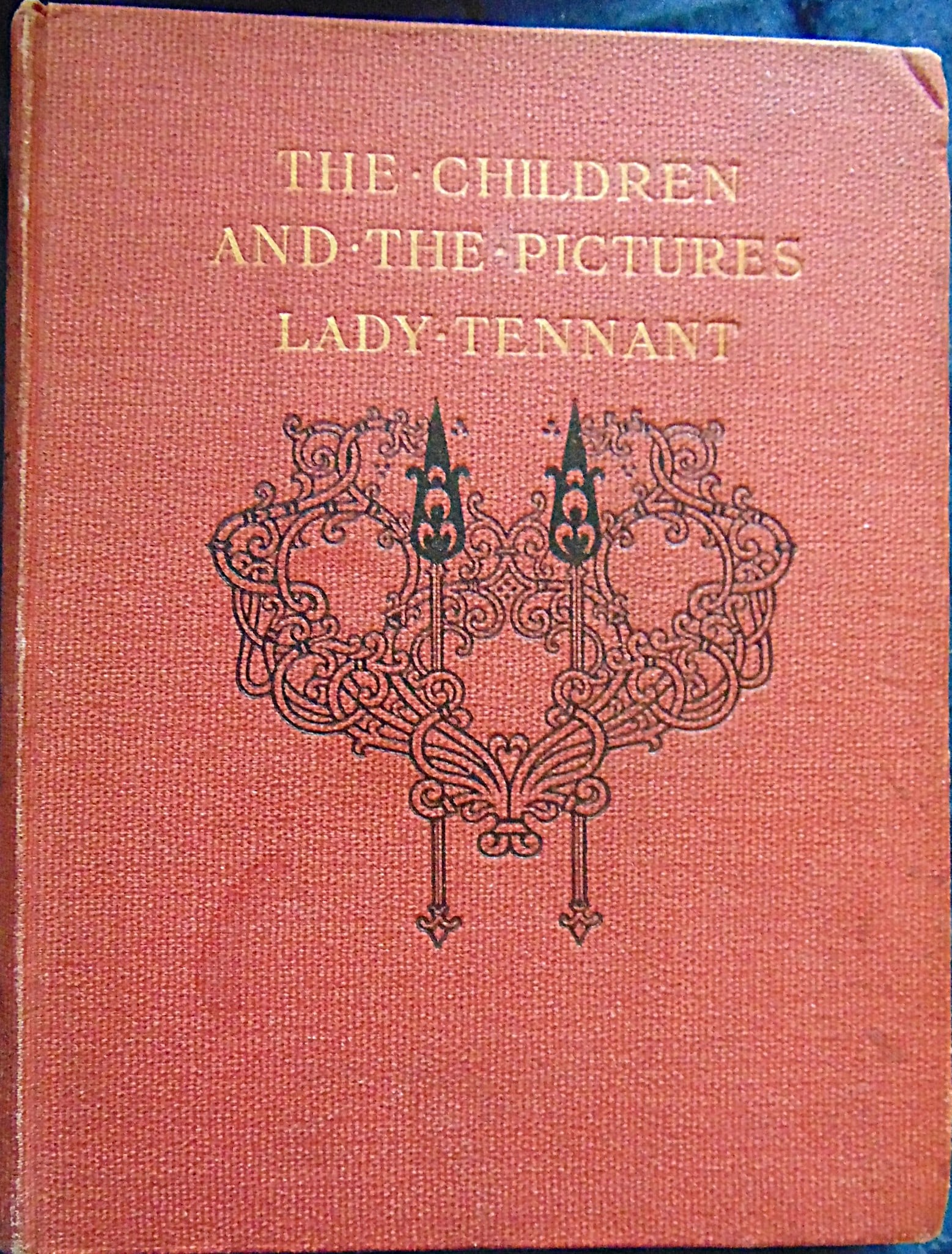 The Children and the Pictures: The Children and the Pictures Very good condition with bright red decorated cover. Tight with all color plates present. Author: Pamela Tennant Illustrations: Color Plates Dated: 1907 Edition: 1st