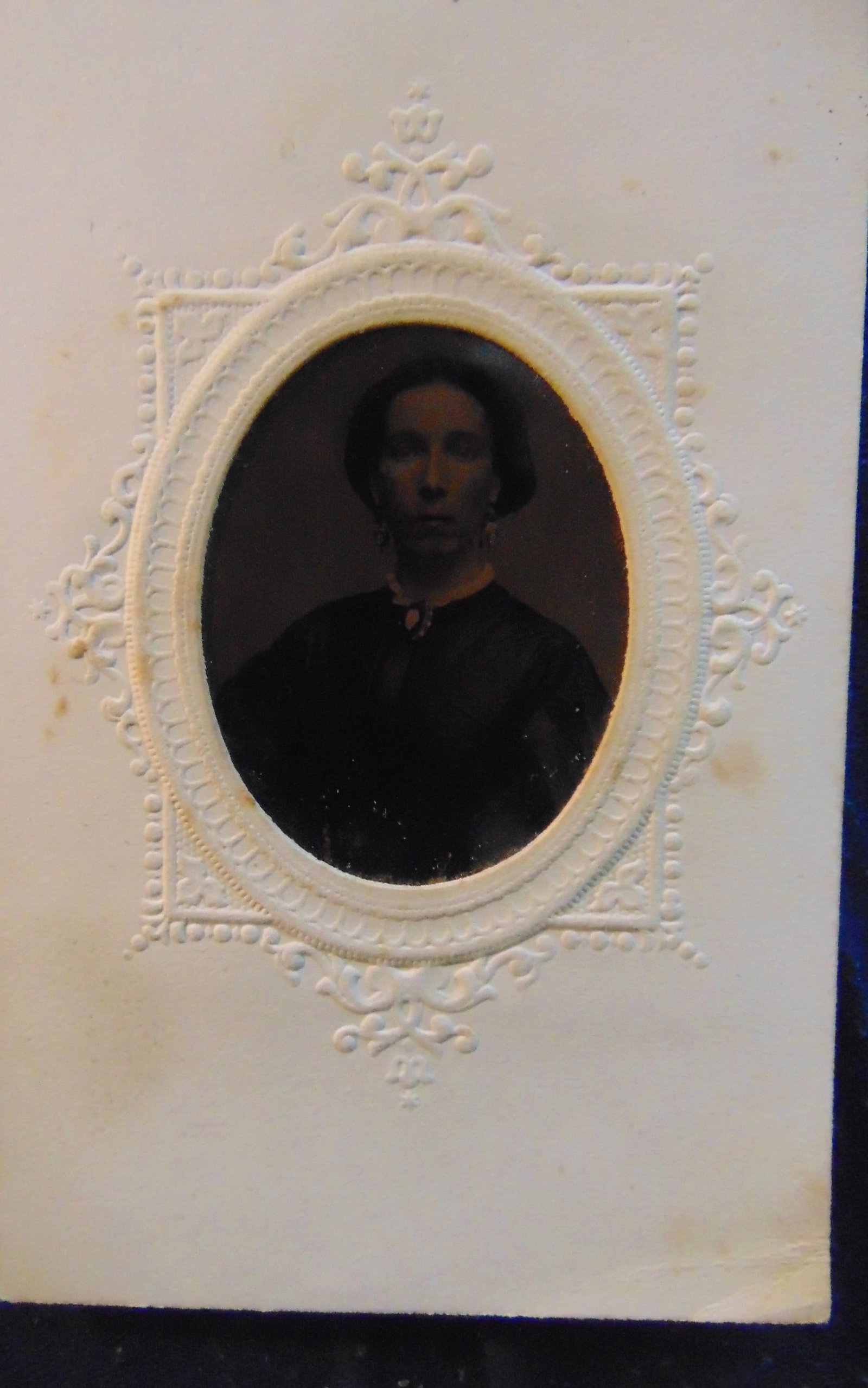 A Portrait of a Lady - Newburgh NY: A Portrait of a Lady A excellent of a lady. From a Newburgh NY estate collection. Embossed front. Photographer: Annon. Dated: Late 1850's Medium: Tintype Dimensions: 3.5 x 2 1/4" Provenance: Hill