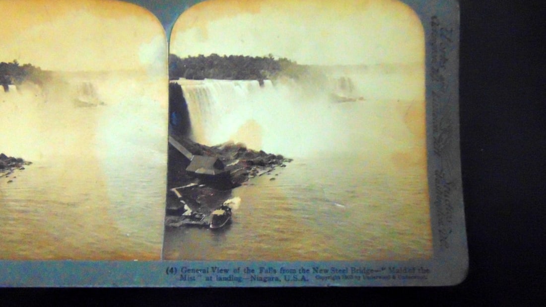 View of Niagara Falls From the New Steel Bridge: General View of the Falls from the new steel bridge. Maid of the Mist at landing - Niagara USA Photographer: Underwood Dated: 1903 Medium: Stereoview Condition Report Toning. Go