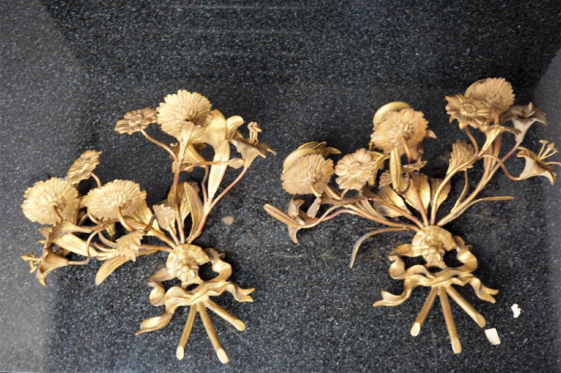 Pair of Floral Brass Sconces: Pair of Floral brass candle sconces measures 9.5" tall and 11" wide