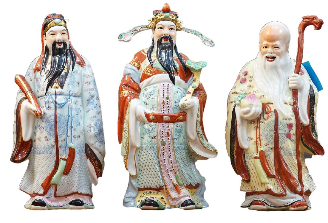 Set of 3 Chinoiserie Scholars Porcelain Statues: 1x3 Chinoiserie wisemen scholar statues. Each measures about 12.5" tall. One symbolizing longevity indicated by the peach in his hand and holding a dragon scepter indicating royalty, and jade which in