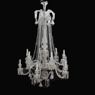 12 Arm Baccarat Crystal Chandelier: 12 arm Venetian style Baccarat chandelier, "Diamant Biseaux" Featured in the Baccarat catalog. Signed in dozens of locations. Serpentine arms culminate in a candle with various cut lead crystal prisms