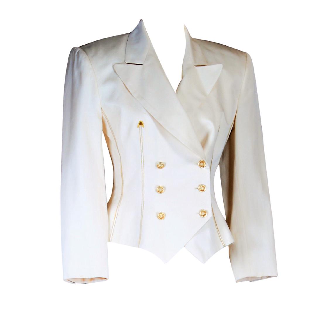 Designer Lavanino Ivory & Gold Skirt Suit: Lavantino ivory and gold accenturated 2pc Skirt Suit featuring a pencil slim skirt and double-breasted blazer with 6 gold-tone medusa mask buttons, wide lapels, and upward pointed metallic gold arrows