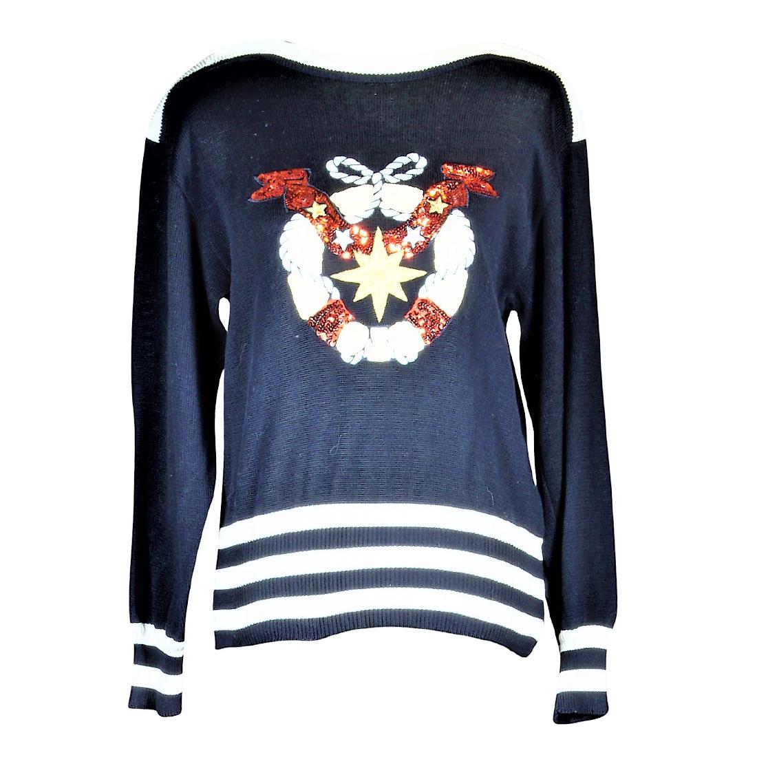 Vintage Escada Embellished Pullover: Vintage Escada by Margaretha Ley deep blue, nearly black, pullover with fitted elastic waistband and cuffs, fold over white collar, off white horizontal striping, and knotted wreath with gold star sil